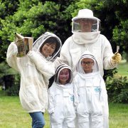 Getting Suited Up to Visit Our Bee Hives